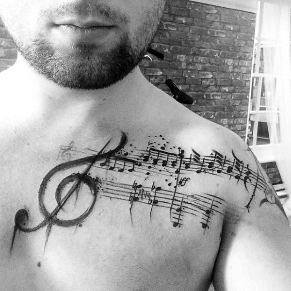 Watercolor mens musical treble clef chest tattoo