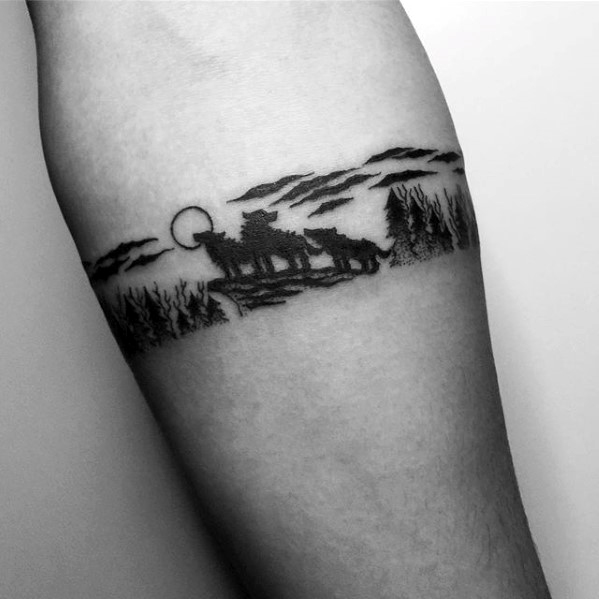 Wolves in nature mens small forearm band tattoo