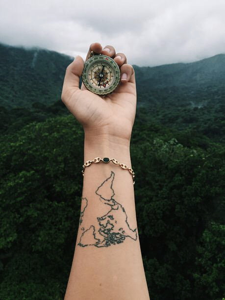 World-map-tattoo-on-the-wrist