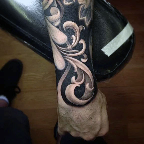 Wrist and forearm male amazing filigree tattoo