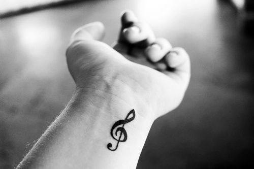 Wrist simple black ink male music note tattoo design ideas