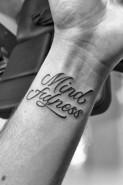 wrist girl tattoo