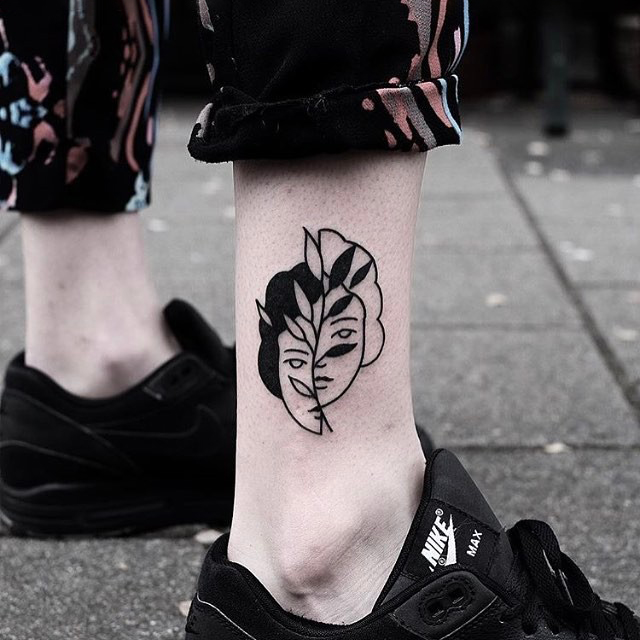 Abstract Face Tattoo