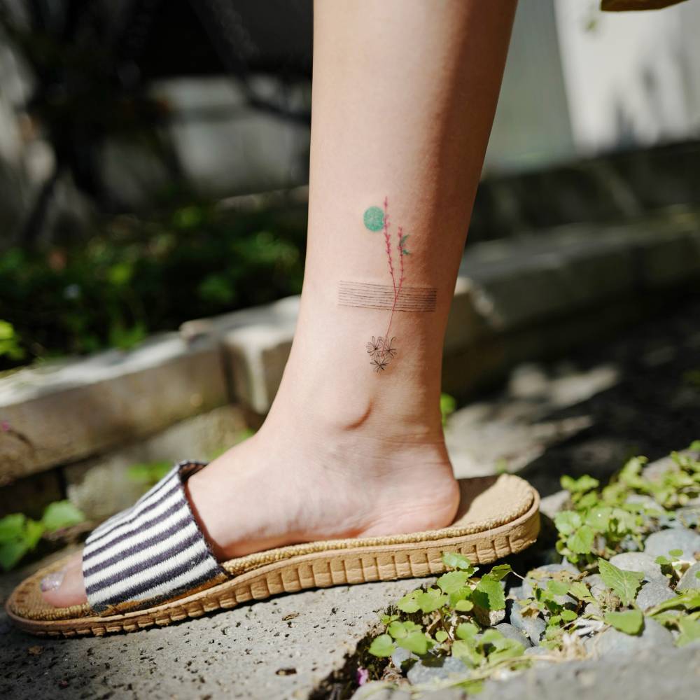 Abstract Tattoo On The Ankle
