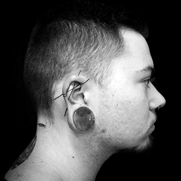 Abstract mens modern black ink lines ear tattoo