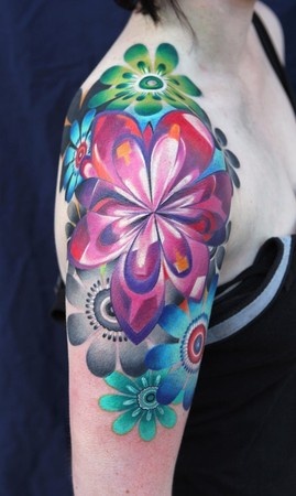 Amazing Shoulder And Sleeve Tattoo