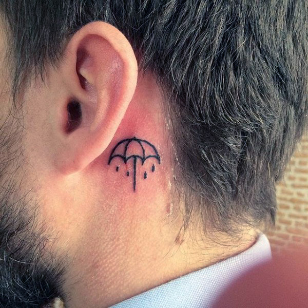 Behind the ear umbrella male ear tattoo