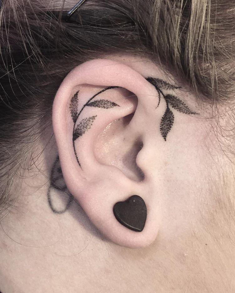 Black Leaf Tattoo On The Ear