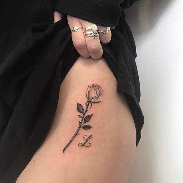 Black Rose And Letter L Tattoo On The Hip