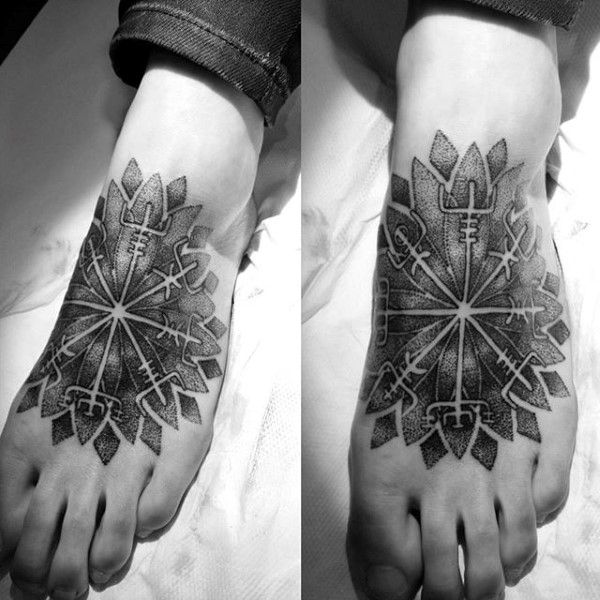 Black and grey tribal design foot tattoo for male