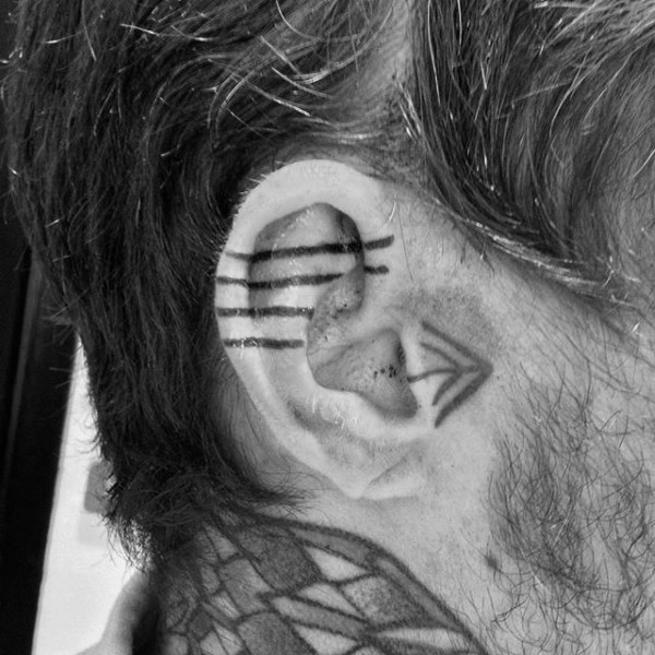 Black ink lines male ear tattoo