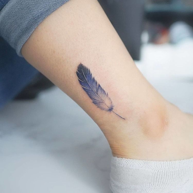 Blue Feather Tattoo On The Ankle
