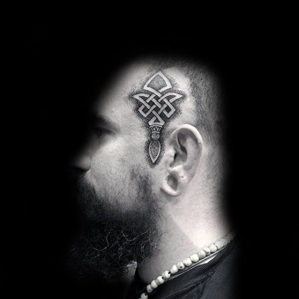 Celtic face tattoos for men with negative space design