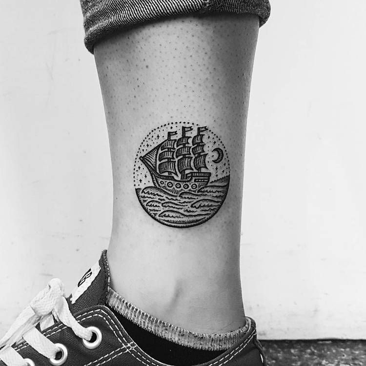 Circular Ship In A Sea Tattoo