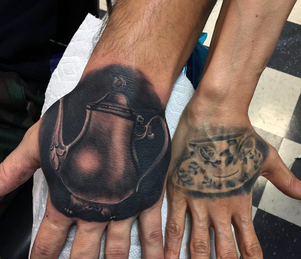 Couples tattoo on hand with realistic 3d tea pot and cup
