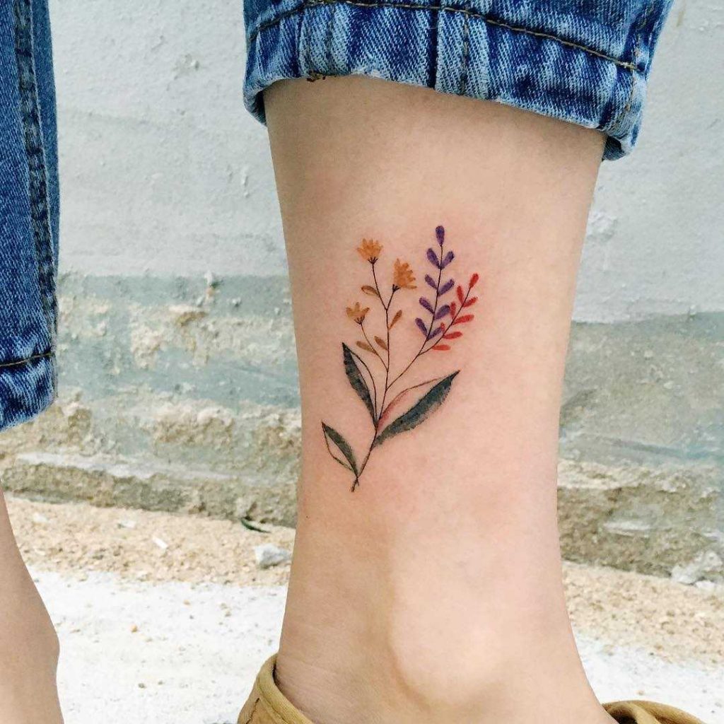 Delicate Flowers On The Left Ankle