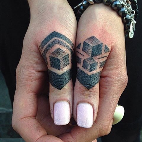 Dot-Work Geometric Tattoos On Fingers