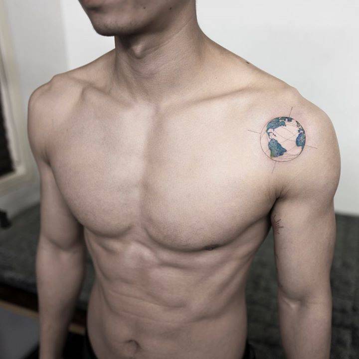 Earth Tattoo On The Left Shoulder
