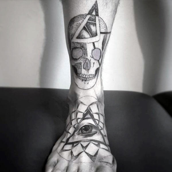 Eye inside triangle and skull tattoo mens foot