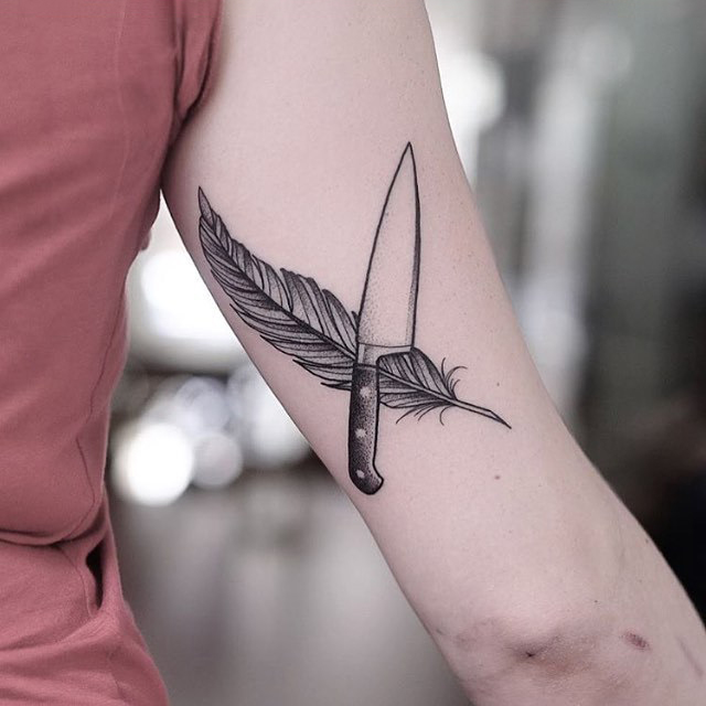 Feather And Knife Tattoo