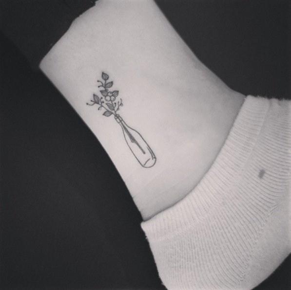 Flowers In A Bottle Tattoo
