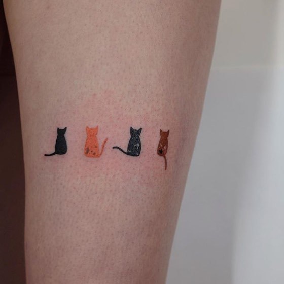 Four Small Cats Tattoo
