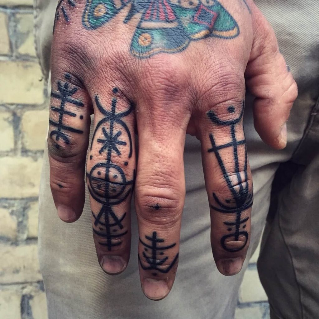 Geometric Shapes Finger Tattoo