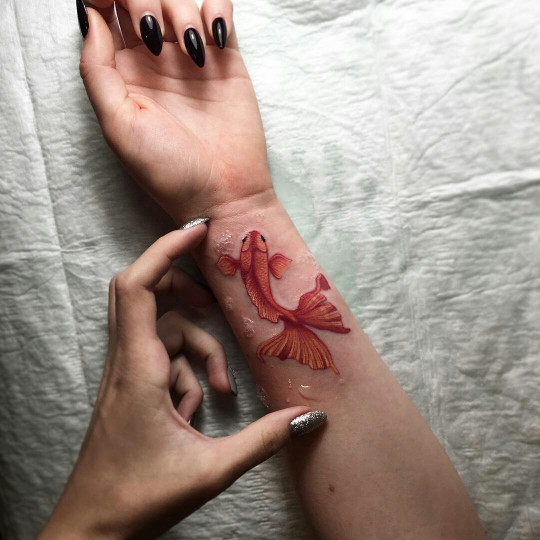 Goldfish Tattoo On The Wrist