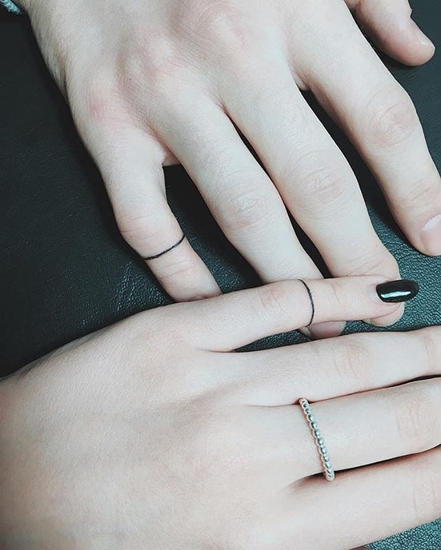 Hand Poked Matching Ring Tattoos