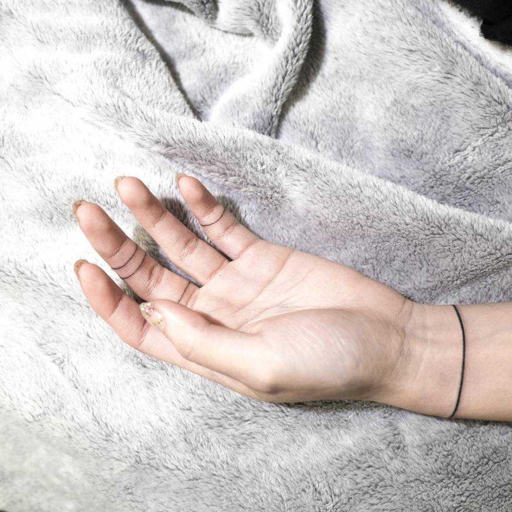 Hand Poked Wristband Tattoo