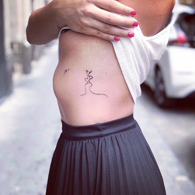 Kissing Faces Silhouette Tattoo