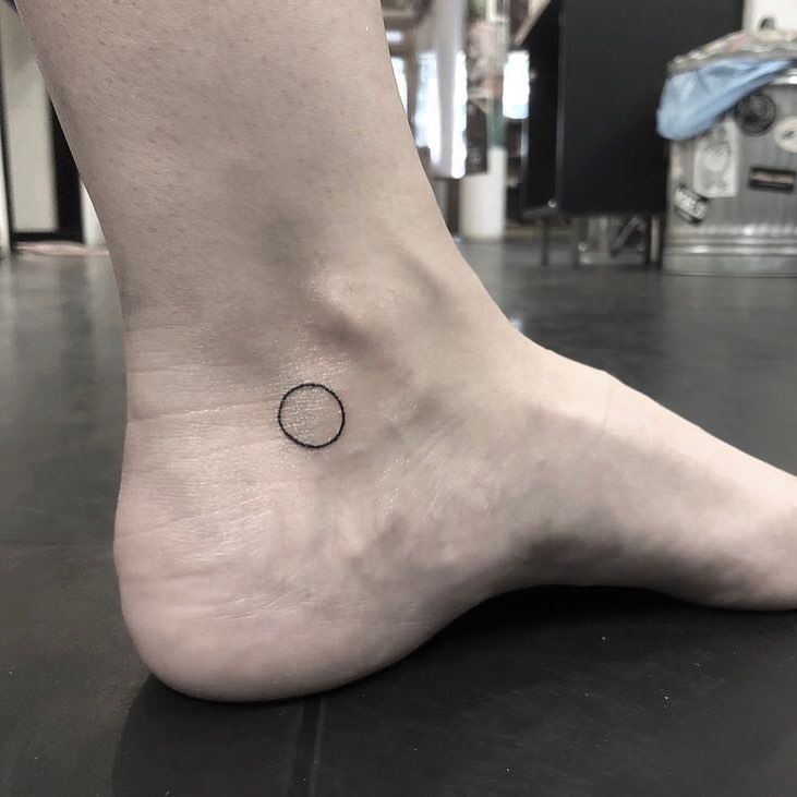 Little Circle Tattoo On The Left Ankle