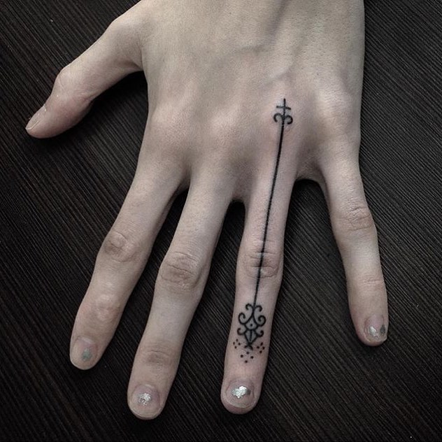 Long Stylized Arrow Tattoo