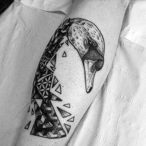 Male with cool geometric swan tattoo design