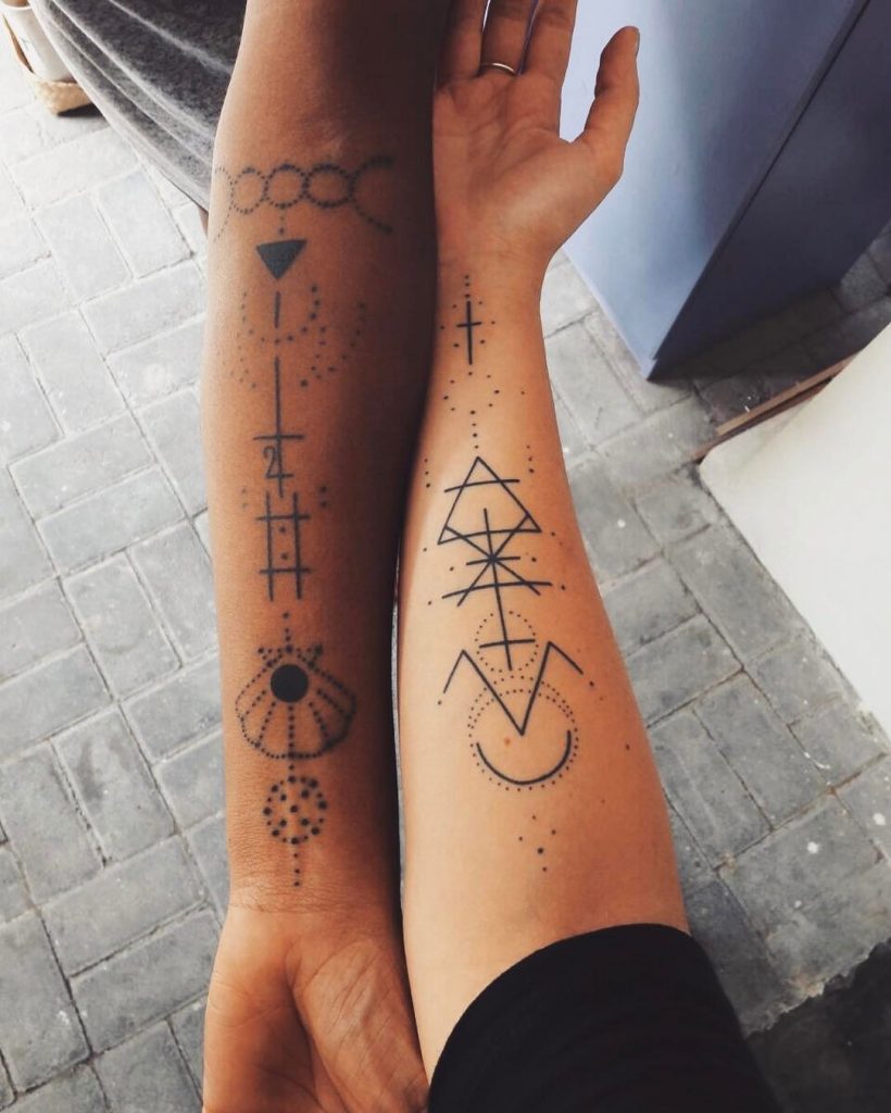 Matching Black Geometric Ornaments Tattoo