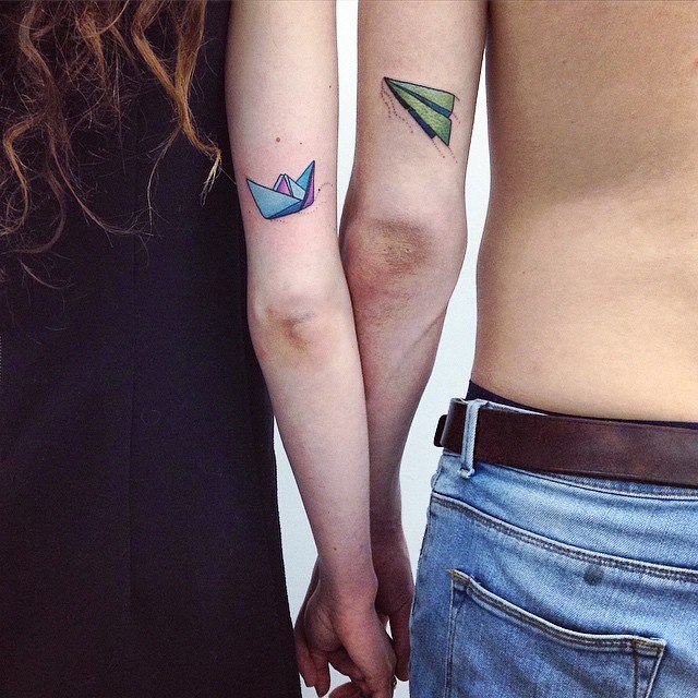 Matching Paper Plane And Boat Tattoo