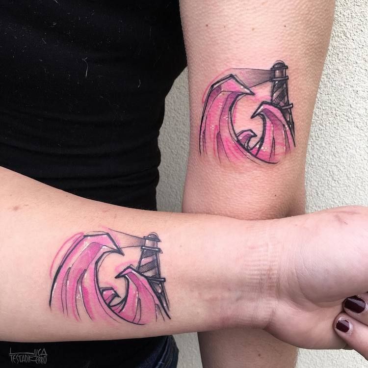 Matching Wave And Lighthouse Tattoo