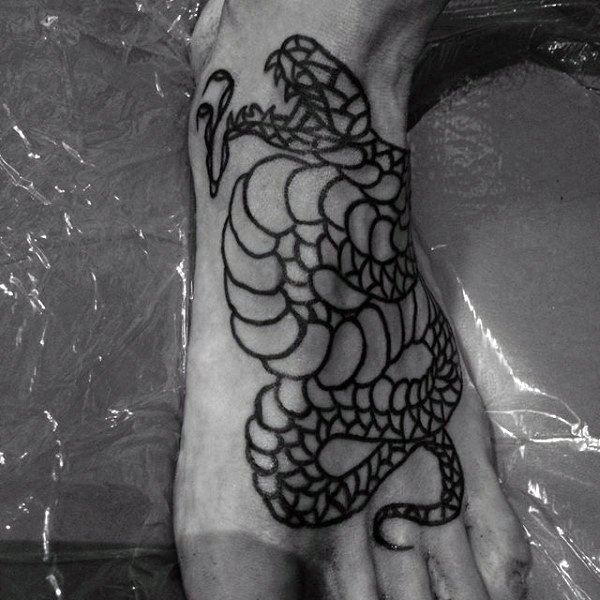 Mens black twisted snake tattoo on foot