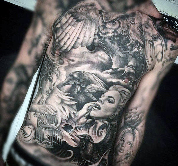 Mens chest and stomach tattoos of owl and clouds