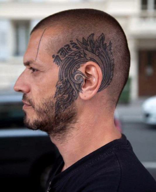 Mens decorative around the ear tattoo
