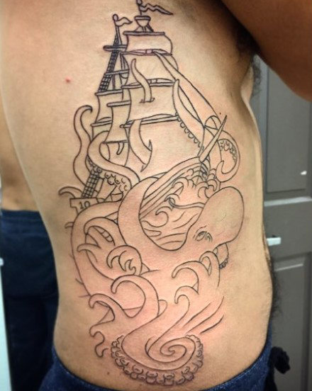 Mens rib tattoo