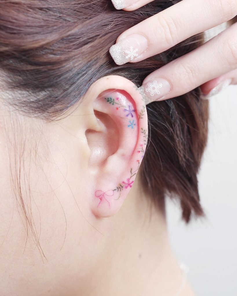 Minimalist Flower Tattoos On The Left Ear