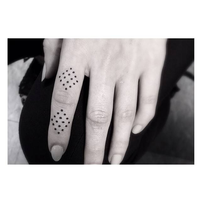 Minimalist Geometric Pattern On The Finger