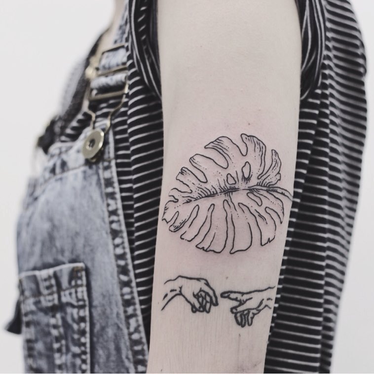 Monstera Leaf And Creation Of Adam Tattoo