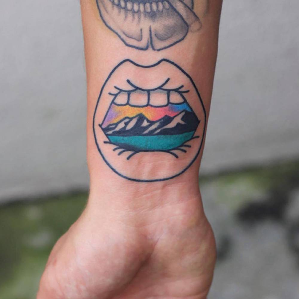 Open Mouth Landscape Tattoo On The Inner Wrist