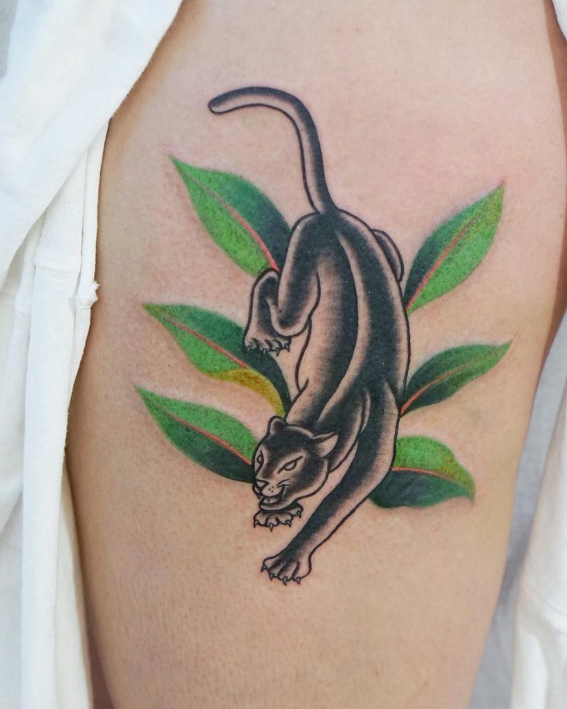 Panther And Green Leaves Tattoo