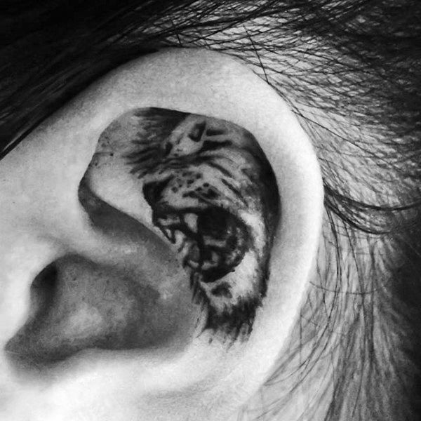 Roaring tiger male ear tattoo