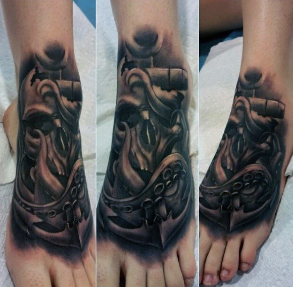 Sinister looking tattoo on foot for men