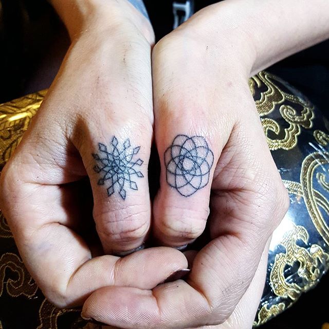 Small Geometric Tattoos On Thumbs