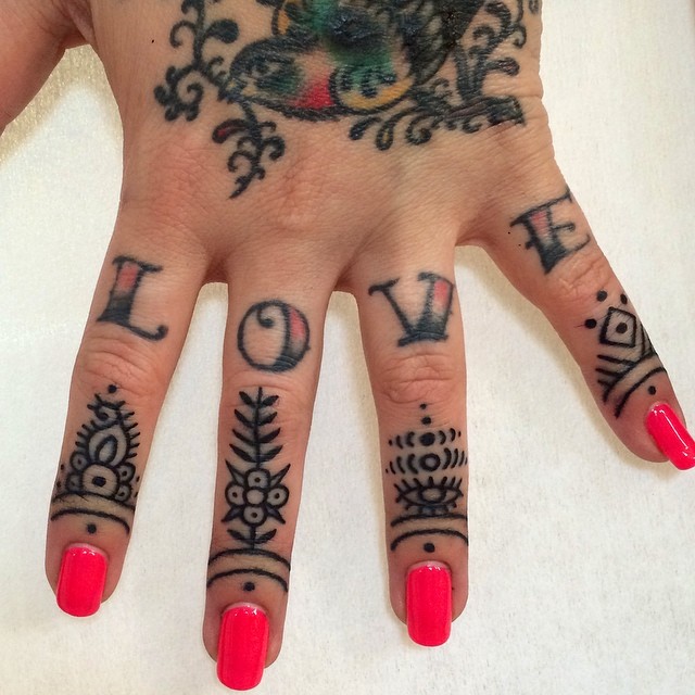 Small Ornament Tattoos On Fingers
